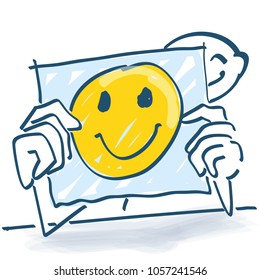Stick figure behind a note paper and a happy face on it