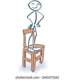 Stick figure stands proudly on the chair