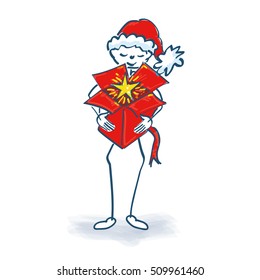 Stick figure unpacking a gift at Christmas Eve