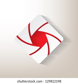 Sticker with an aperture design with red insertions