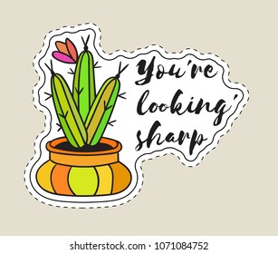 Sticker with cactus in pot with the inscription You are looking sharp. Colored funny cute patch with black contour. Design for tag, label, sticker, postcard, greeting card. Vector illustration.