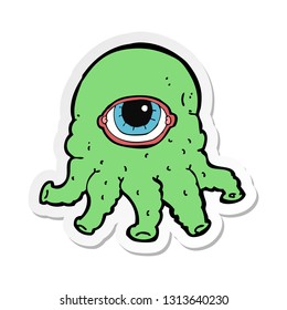 pegatina de una cabeza alienígena de caricatura