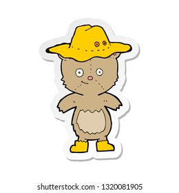 sticker of a cartoon bear in hat
