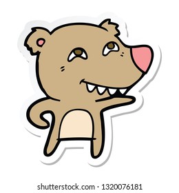 sticker of a cartoon bear showing teeth