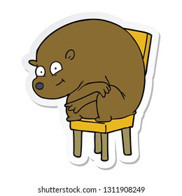 sticker of a cartoon bear sitting on chair