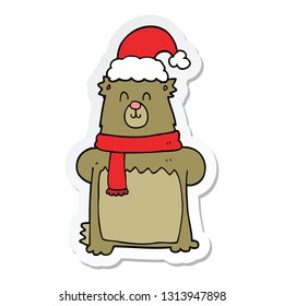 sticker of a cartoon bear wearing christmas hat
