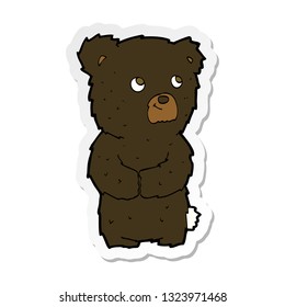 sticker of a cartoon black bear cub