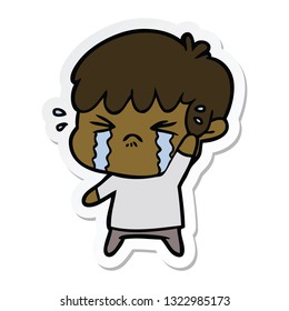 sticker of a cartoon boy crying