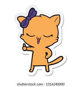 sticker of a cartoon cat with bow on head