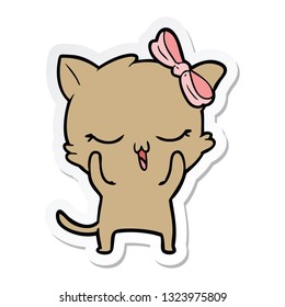 sticker of a cartoon cat with bow on head
