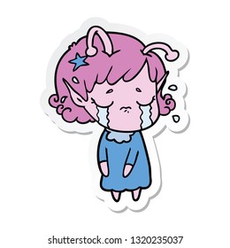 sticker of a cartoon crying alien girl