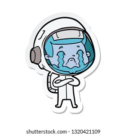 sticker of a cartoon crying astronaut