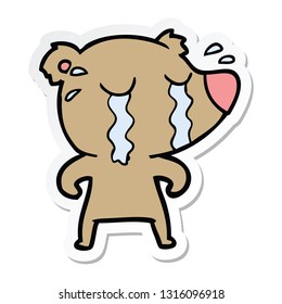 sticker of a cartoon crying bear