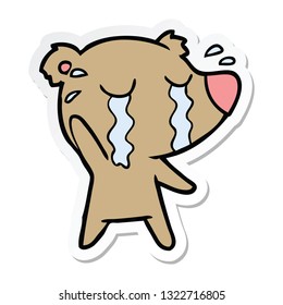 sticker of a cartoon crying bear