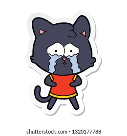 sticker of a cartoon crying cat