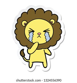 sticker of a cartoon crying lion