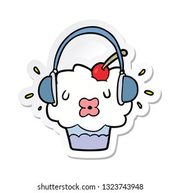 sticker of a cartoon cupcake listening to music