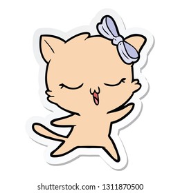 pegatina de una caricatura bailando gato con arco sobre la cabeza