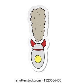 adesivo de um desenho animado caindo bomba