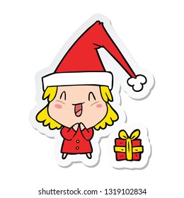 sticker of a cartoon girl wearing christmas hat