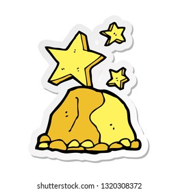 sticker of a cartoon gold nugget