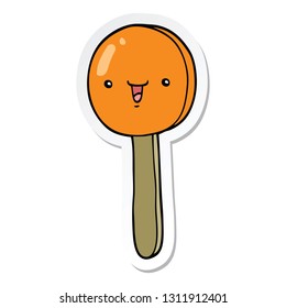 sticker of a cartoon lollipop