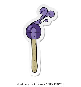 sticker of a cartoon lollipop