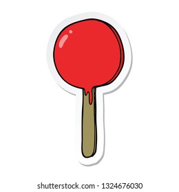 sticker of a cartoon lollipop