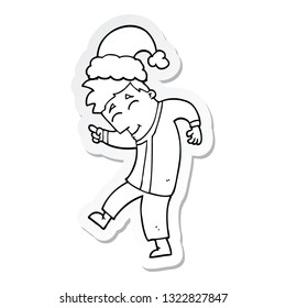 sticker of a cartoon man wearing christmas hat