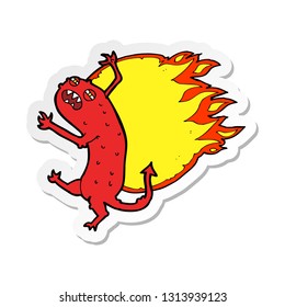 sticker of a cartoon monster on fire