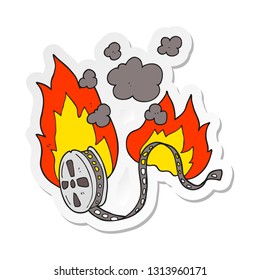 sticker of a cartoon movie film burning