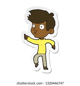 pegatina de un niño señalando una caricatura