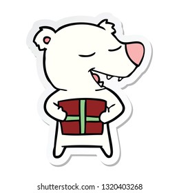 sticker of a cartoon polar bear with present