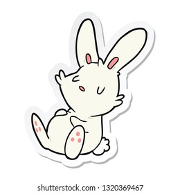 sticker of a cartoon rabbit sleeping
