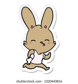 sticker of a cartoon running rabbit