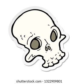 sticker of a cartoon spooky skull