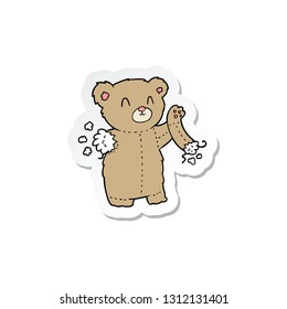 pegatina de un oso de peluche con brazo roto