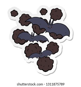 sticker of a cartoon vampire bats