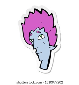 sticker of a cartoon vampire head