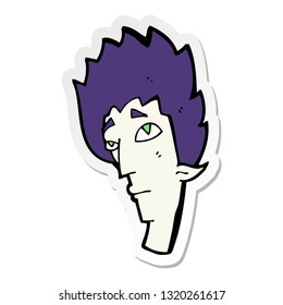 sticker of a cartoon vampire head