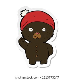 sticker of a cartoon waving black teddy bear in winter hat