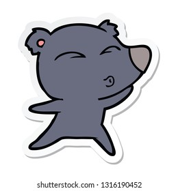sticker of a cartoon whistling bear