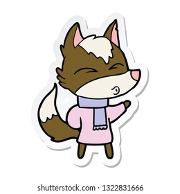 sticker of a cartoon wolf in winter clothes