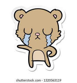 sticker of a crying cartoon bear