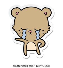 sticker of a crying cartoon bear