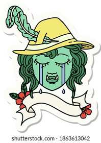 sticker of a crying half orc bard character face