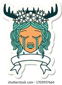 sticker of a crying orc druid character face