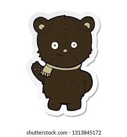 sticker of a cute cartoon black bear waving