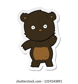sticker of a cute cartoon black bear