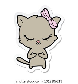 sticker of a cute cartoon cat with bow
